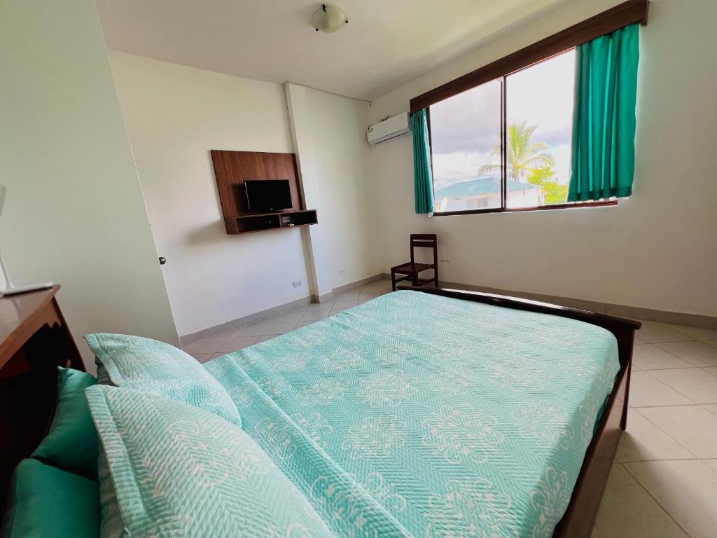 Postel nebo postele na pokoji v ubytování Hotel Sierra Negra