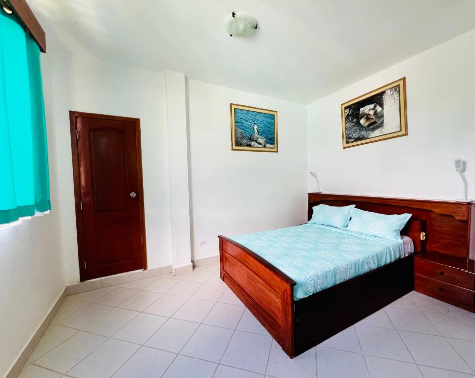 Postel nebo postele na pokoji v ubytování Hotel Sierra Negra