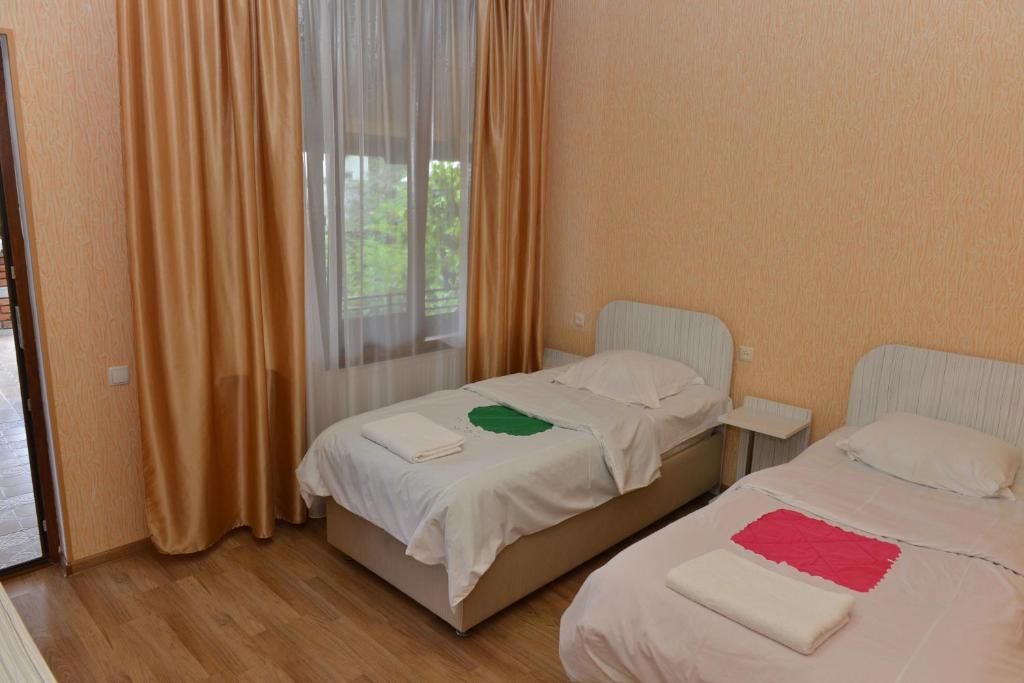 Postel nebo postele na pokoji v ubytování Tourist