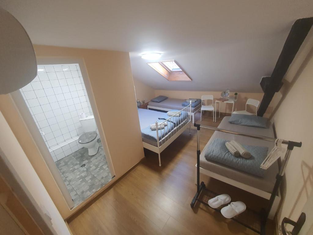 an overhead view of a room with two beds at Kapana Stay at Center Plovdiv in Plovdiv