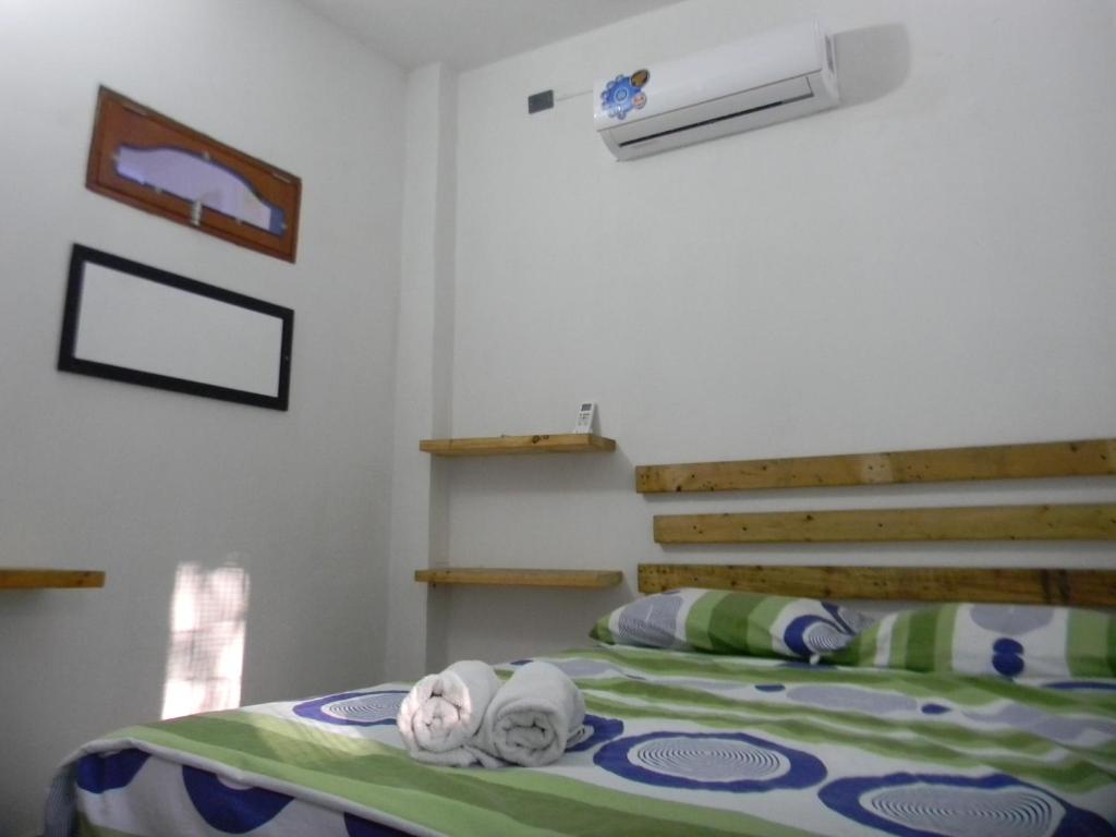 Postel nebo postele na pokoji v ubytování HostalNativo