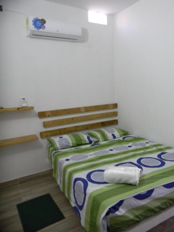Postel nebo postele na pokoji v ubytování HostalNativo