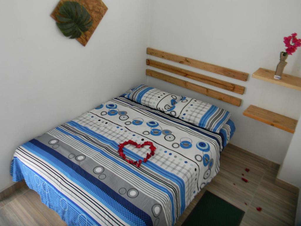 Postel nebo postele na pokoji v ubytování HostalNativo