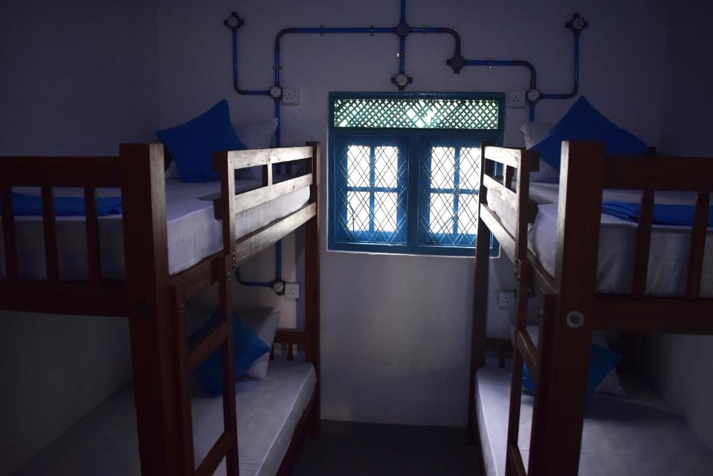 Postel nebo postele na pokoji v ubytování Chill House Hostel
