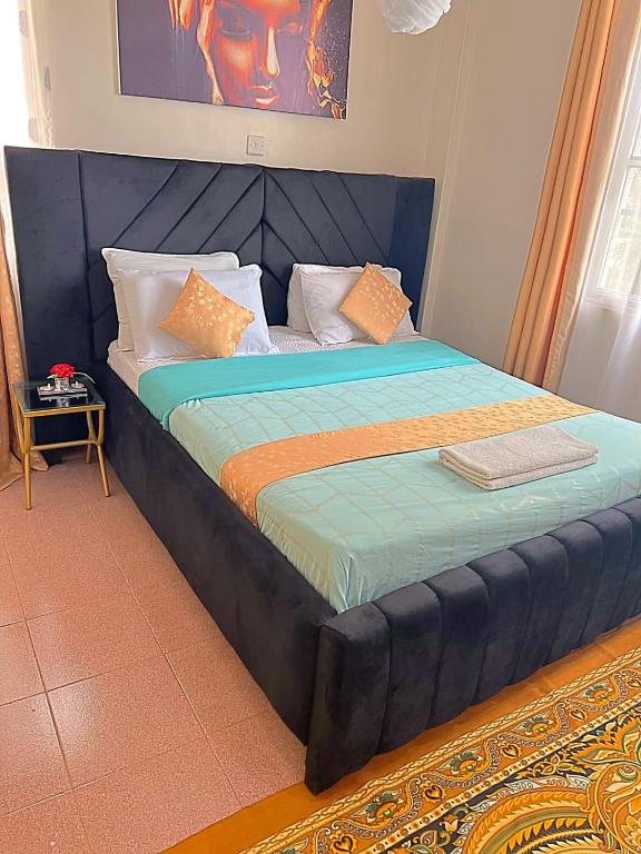 Postel nebo postele na pokoji v ubytování Homely apt 3 (three)