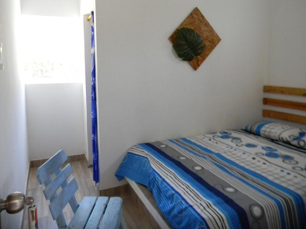 Postel nebo postele na pokoji v ubytování HostalNativo