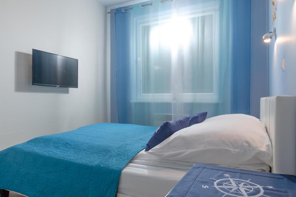 Postel nebo postele na pokoji v ubytování Apartament HAPPY 302 Łukęcin BlueMare basen EPapartamenty