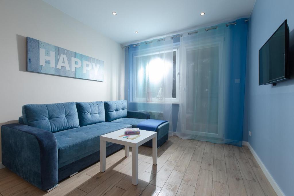 TV a/nebo společenská místnost v ubytování Apartament HAPPY 302 Łukęcin BlueMare basen EPapartamenty