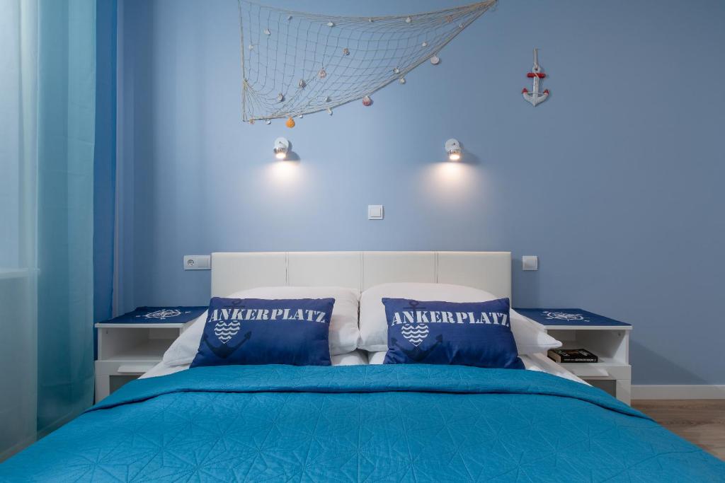 Postel nebo postele na pokoji v ubytování Apartament HAPPY 302 Łukęcin BlueMare basen EPapartamenty