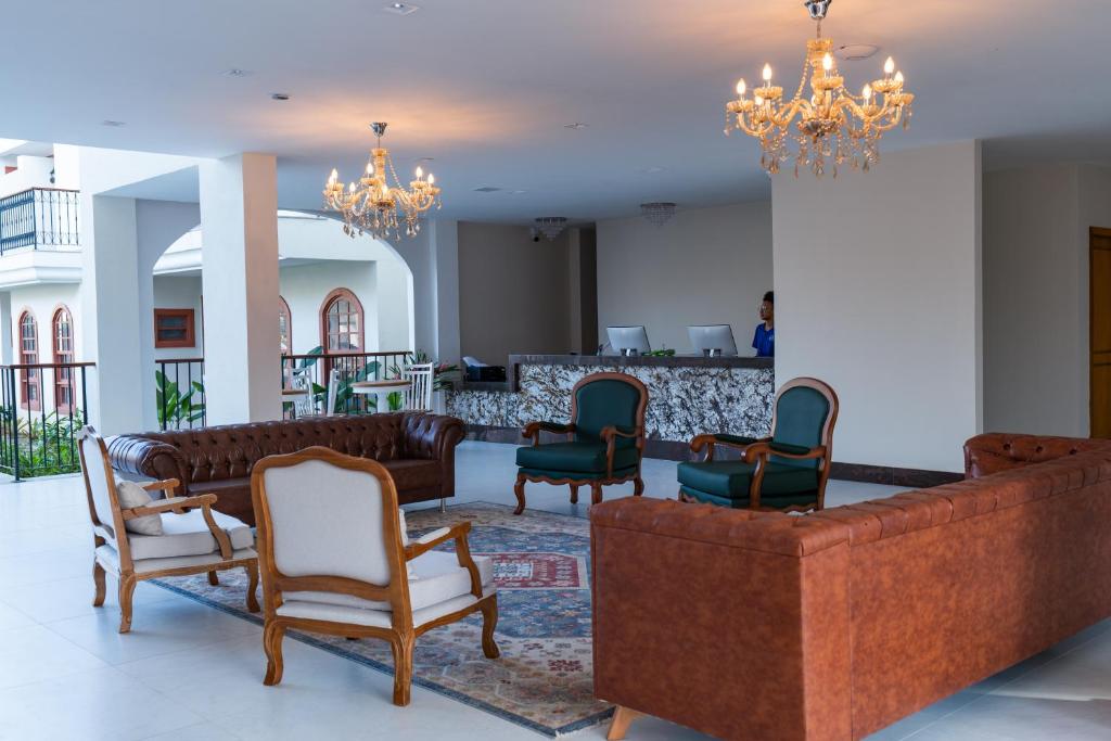 Uma área de estar em Resende Imperial Hotel & Spa