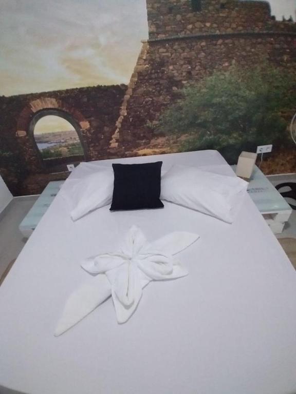 Postel nebo postele na pokoji v ubytování Palmira House