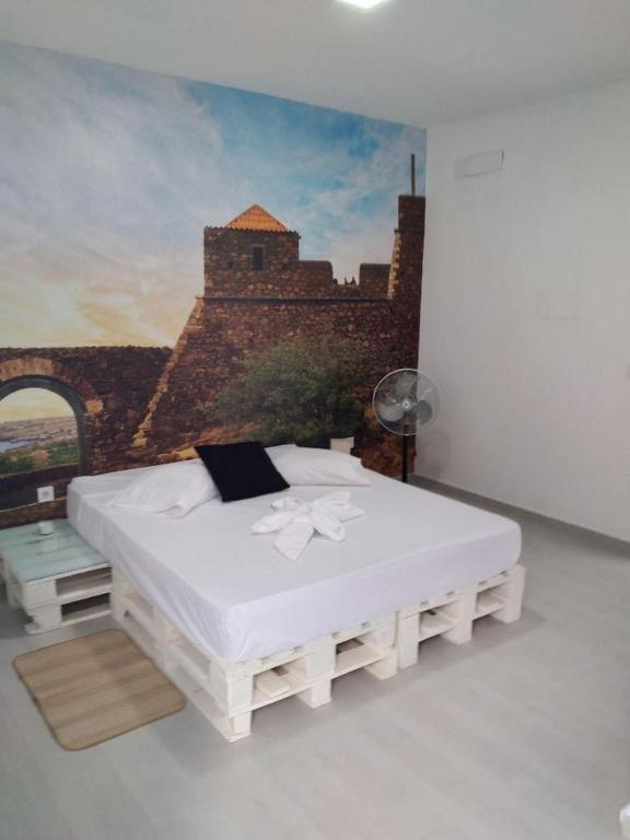 Postel nebo postele na pokoji v ubytování Palmira House