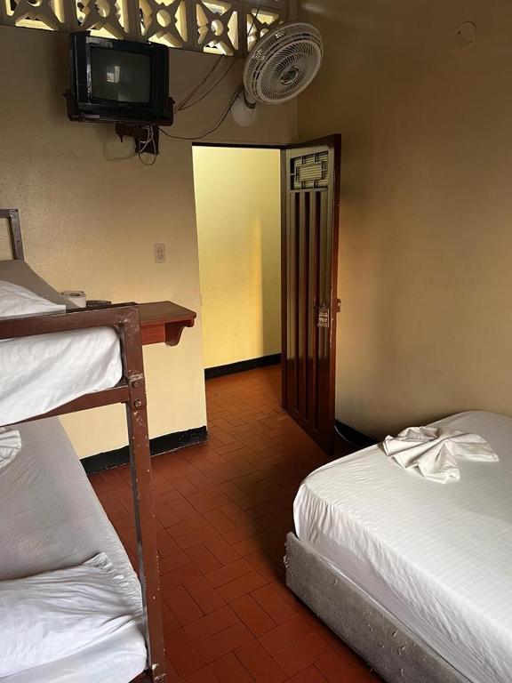 Postel nebo postele na pokoji v ubytování Nuevo hospedaje benny