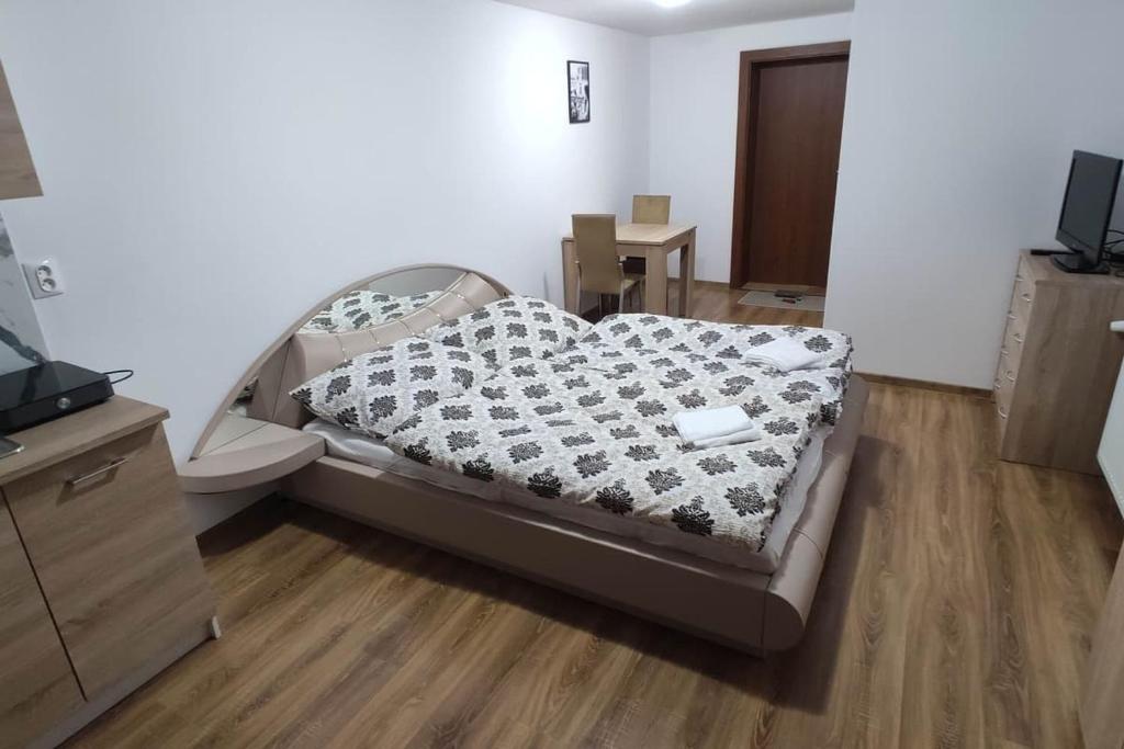 Postel nebo postele na pokoji v ubytování Apartmany Tatra Relax, Velky Slavkov