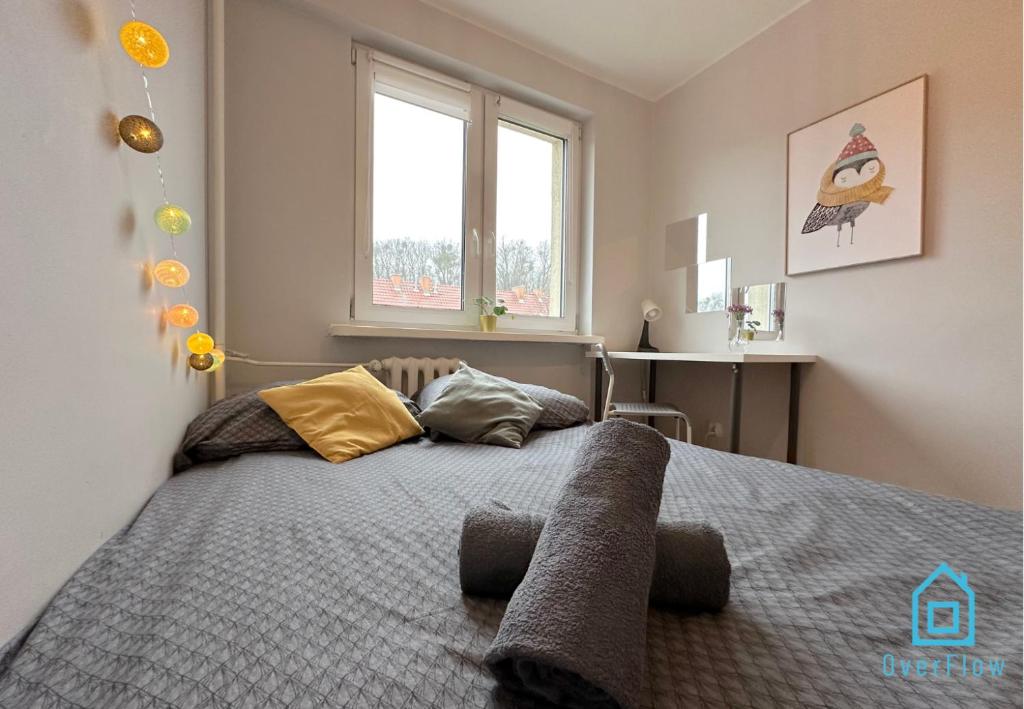 Posteľ alebo postele v izbe v ubytovaní Superfly room 10 Min to Old Town Gdańsk,PKP & Shopping Mall