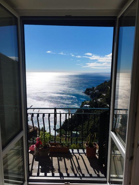 a view of the ocean from a balcony at Casa Mamma Mia in Albori