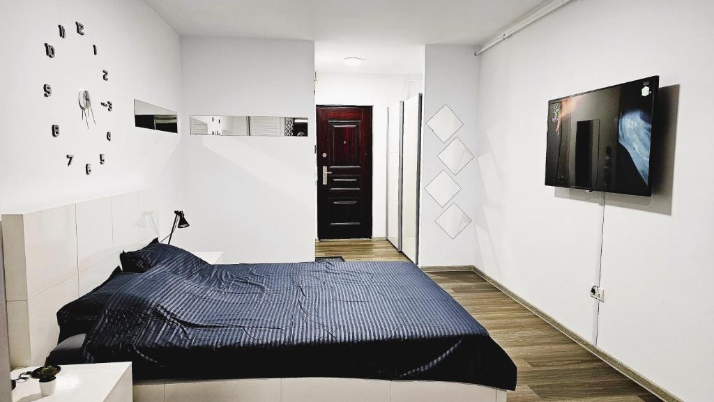 Postel nebo postele na pokoji v ubytování Spoil Yourself with Style, Comfort and Luxury - Tony's Studios Luxury