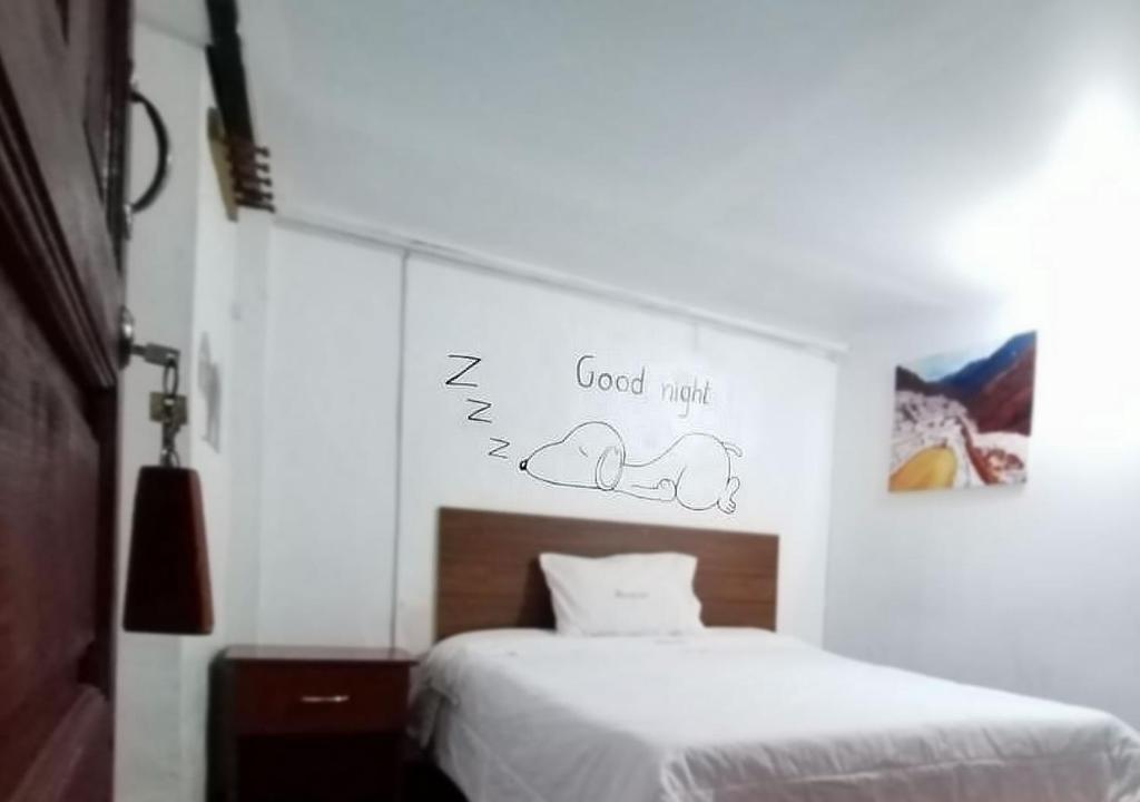 Postel nebo postele na pokoji v ubytování Ccapaq Wasi