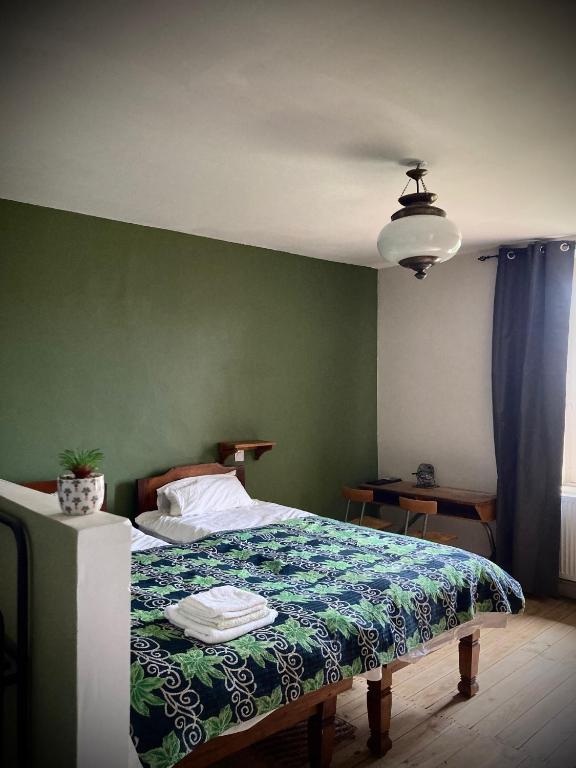 Postel nebo postele na pokoji v ubytování Maison d'Hôtes & Savonnerie de Bonnefon