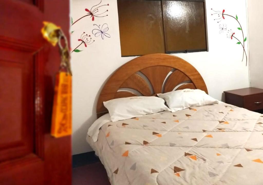 Postel nebo postele na pokoji v ubytování Ccapaq Wasi