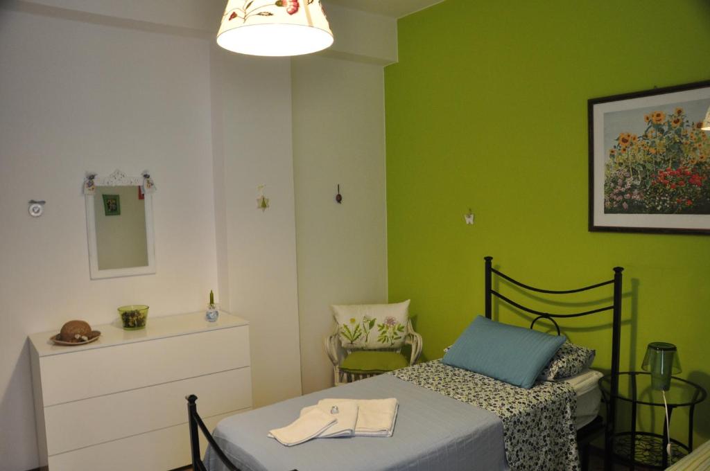 Un pat sau paturi într-o cameră la Apartment Ponte delle Nazioni