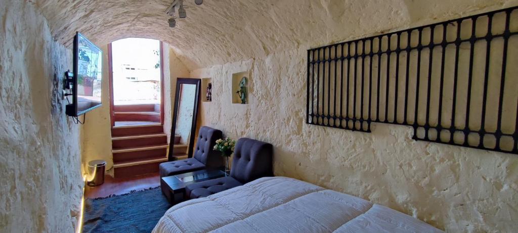 Postel nebo postele na pokoji v ubytování Flying Dog Hostel Arequipa