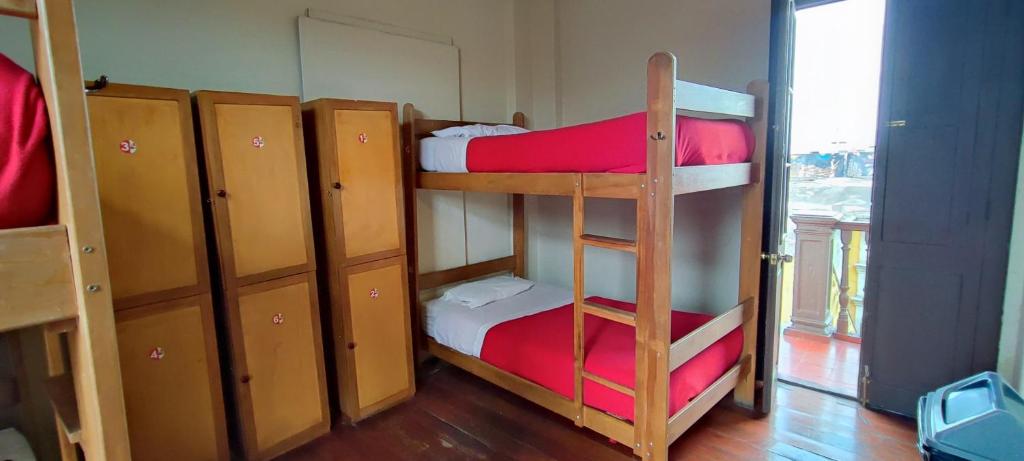 Postel nebo postele na pokoji v ubytování Flying Dog Hostel Arequipa