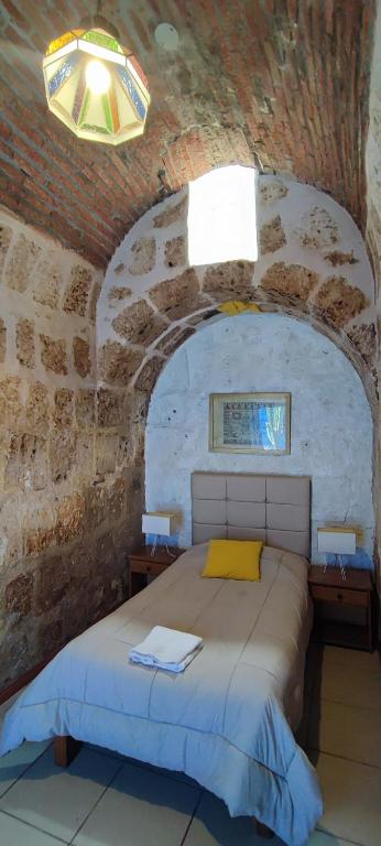 Postel nebo postele na pokoji v ubytování Flying Dog Hostel Arequipa