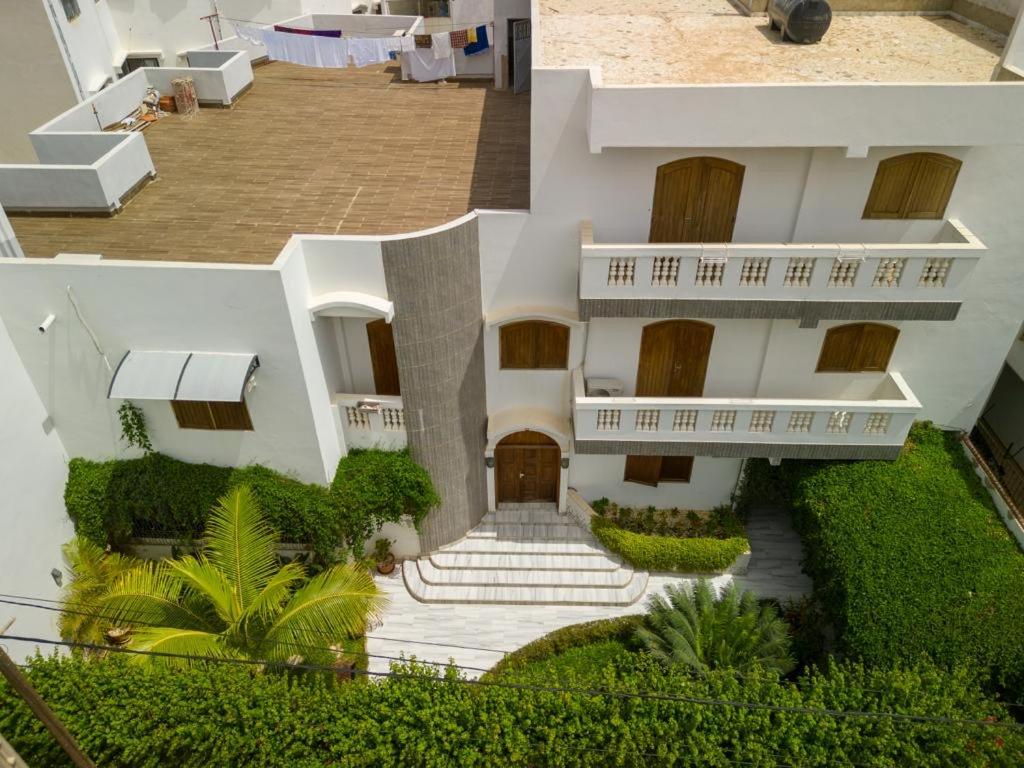 an overhead view of a building with a courtyard at STUDIO BIAGUI 2 in Dakar