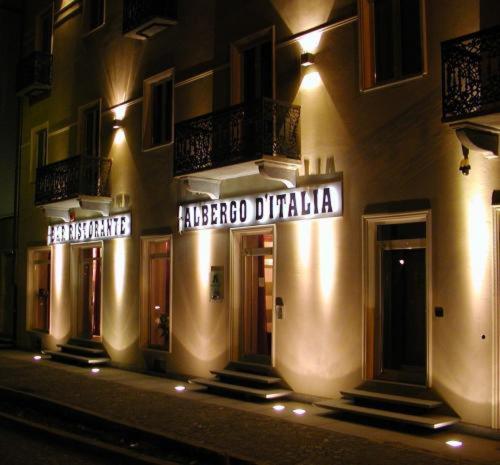 a building with a sign on the side of it at Albergo D'italia in Chivasso