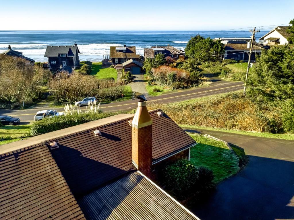 a roof of a house with a view of the ocean at Beach Bungalow in Manzanita