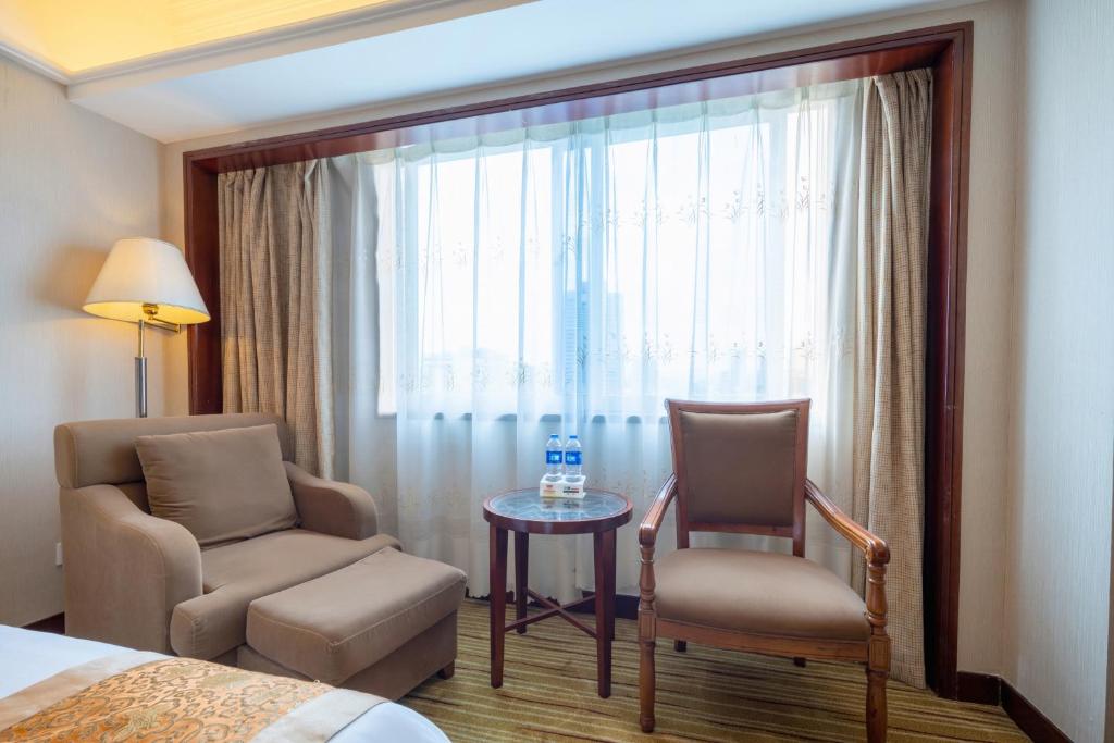 Posezení v ubytování Sunshine Holiday Hotel Fuzhou