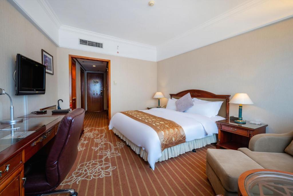 TV a/nebo společenská místnost v ubytování Sunshine Holiday Hotel Fuzhou