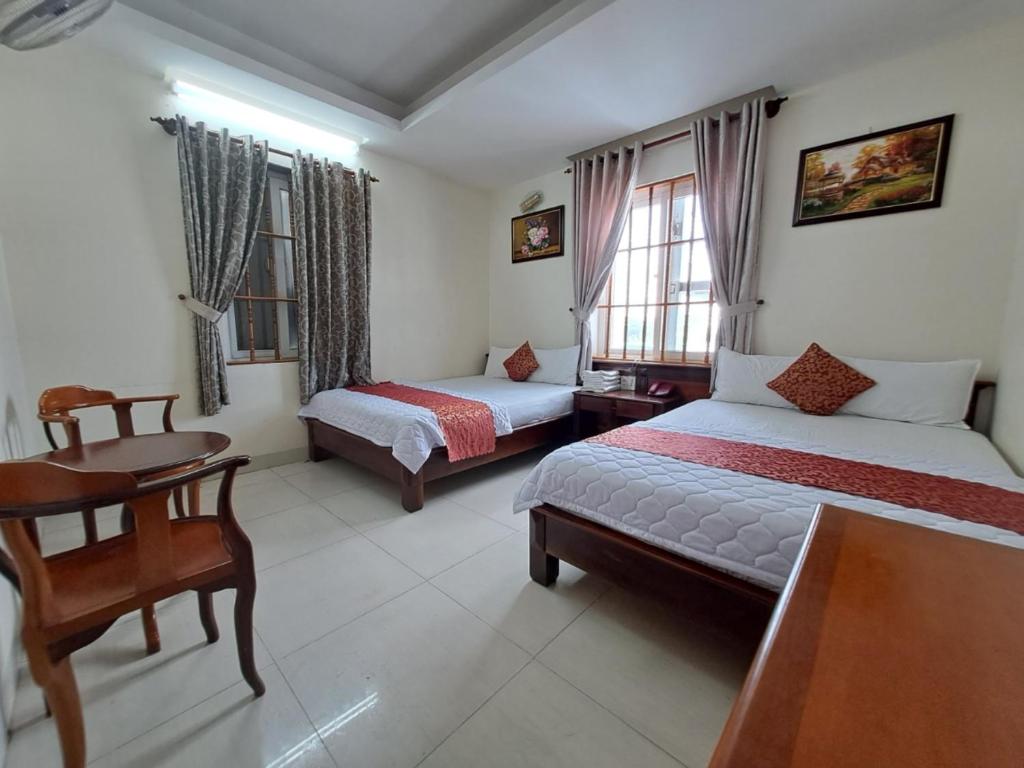 Postel nebo postele na pokoji v ubytování ĐẠI AN Hotel