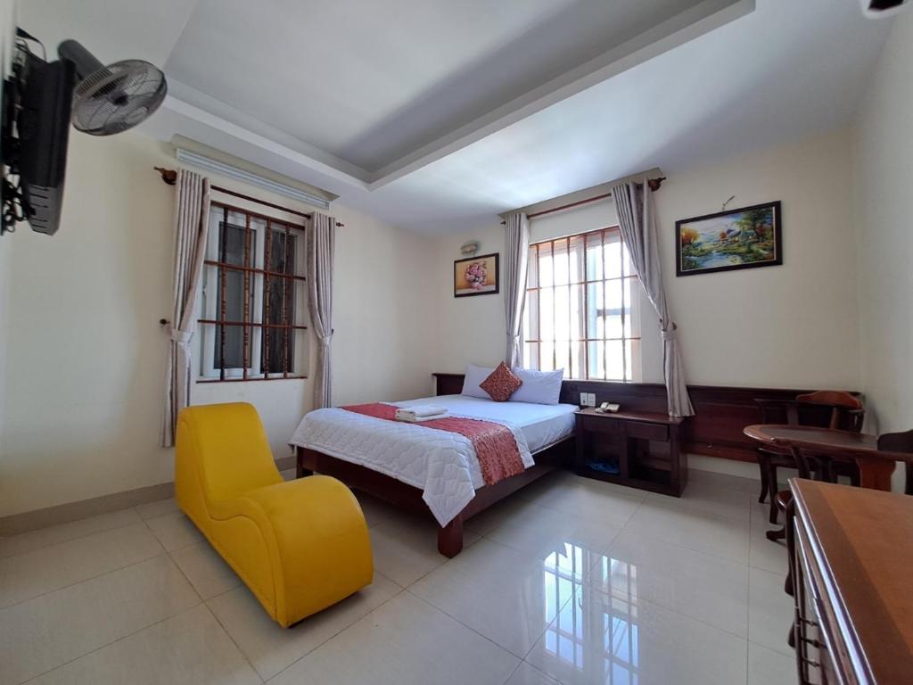 Postel nebo postele na pokoji v ubytování ĐẠI AN Hotel