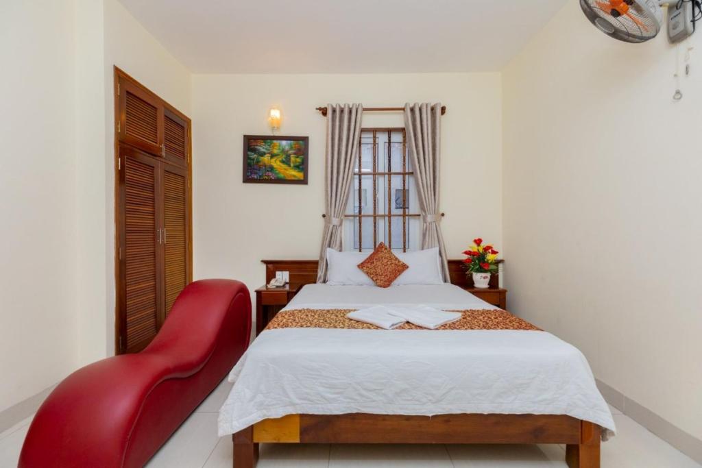 Postel nebo postele na pokoji v ubytování ĐẠI AN Hotel