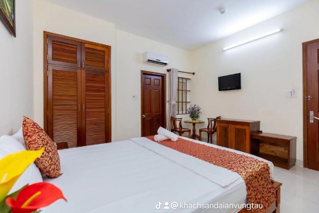 Postel nebo postele na pokoji v ubytování ĐẠI AN Hotel