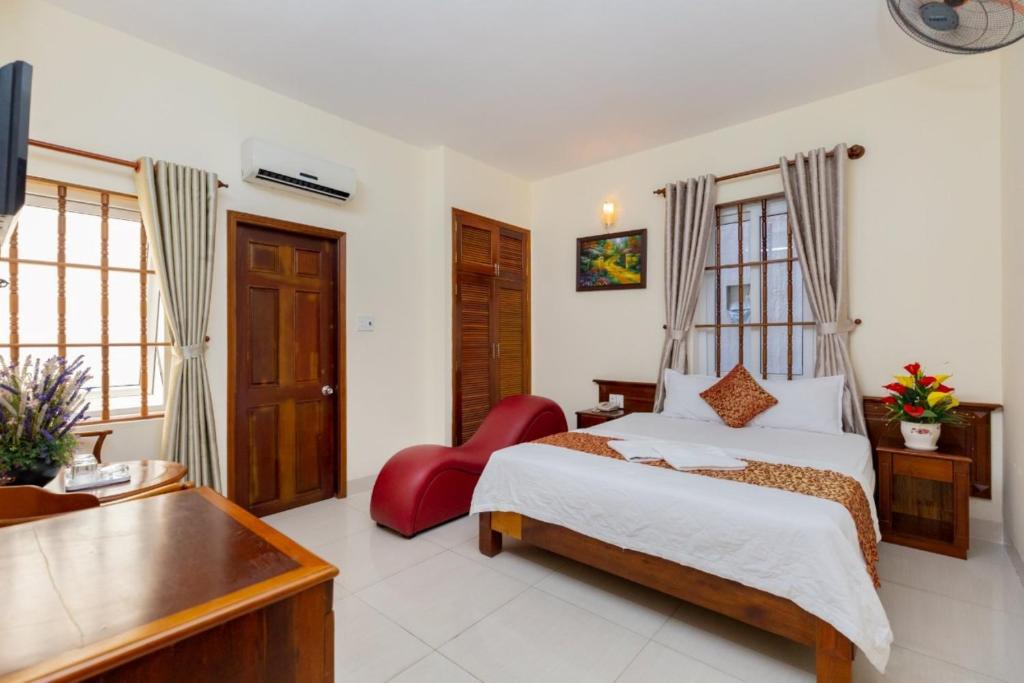 Postel nebo postele na pokoji v ubytování ĐẠI AN Hotel