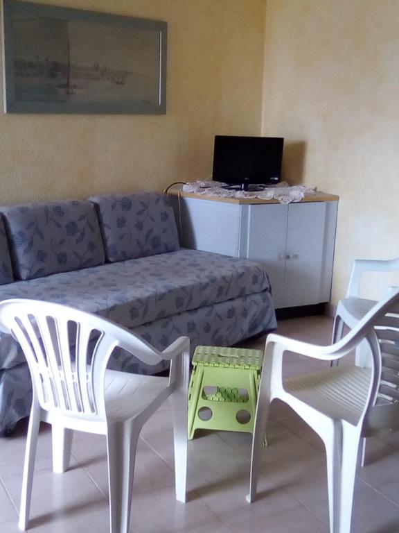TV a/nebo společenská místnost v ubytování Princess des Iles