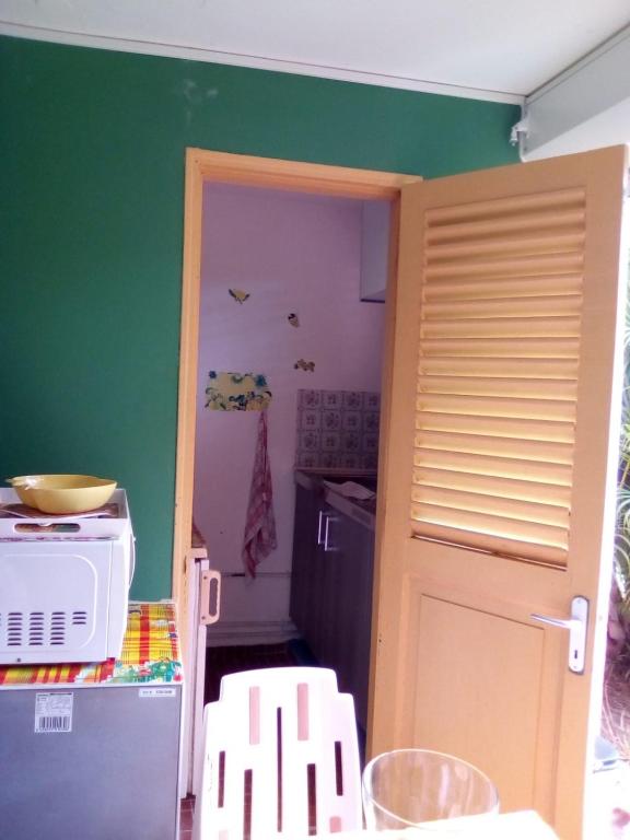 Kuchyň nebo kuchyňský kout v ubytování Princess des Iles