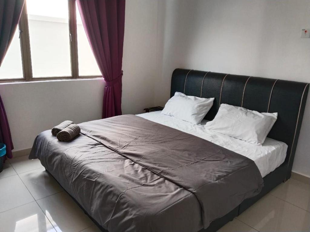 Postel nebo postele na pokoji v ubytování KSP Guest House