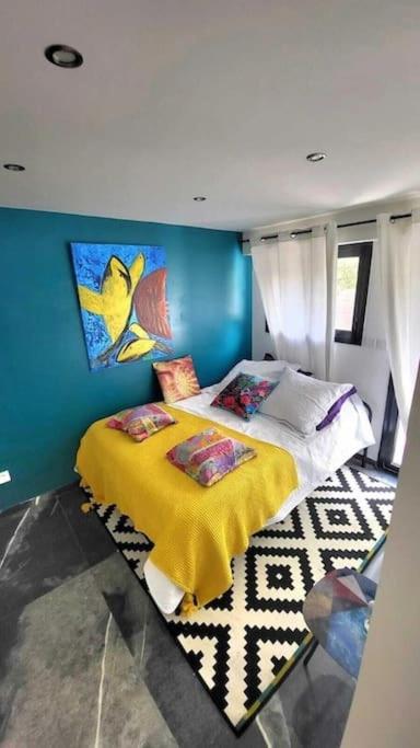 Rúm í herbergi á T3 luxe vue mer