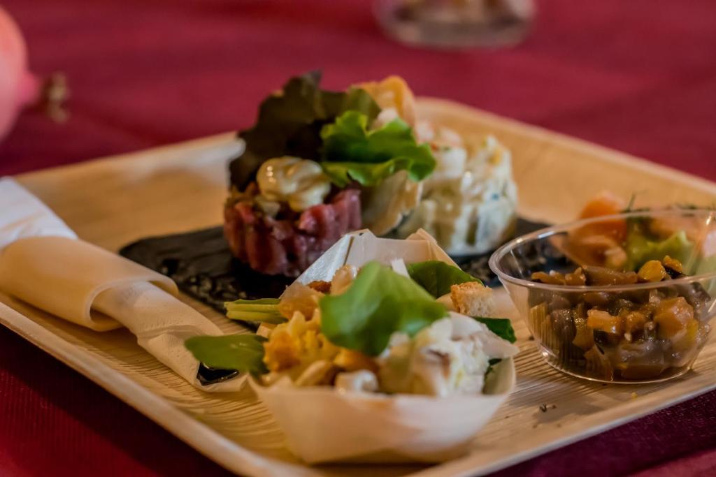 a tray with several different types of food on it at agriturismo il Borgo in Cetona