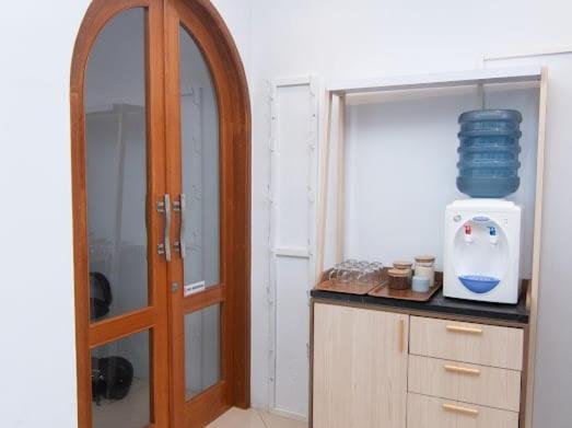 Kuchyň nebo kuchyňský kout v ubytování Kareem Syariah Hostel Bukittinggi