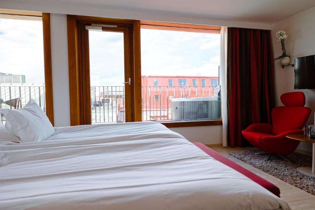 Postel nebo postele na pokoji v ubytování Avalon Hotel