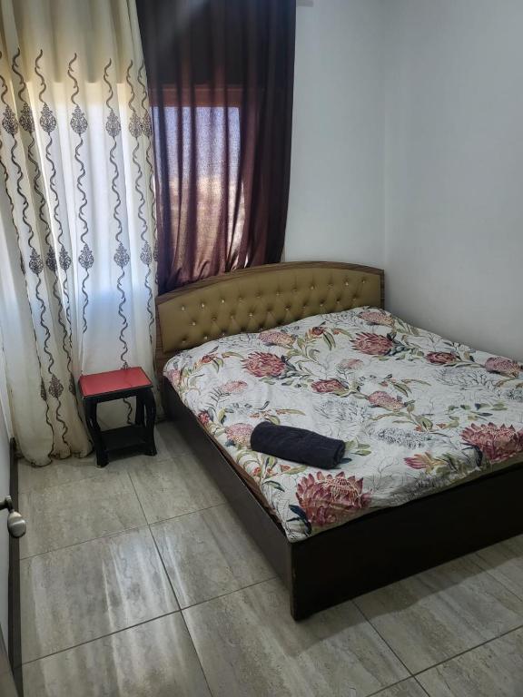 Postel nebo postele na pokoji v ubytování اوليفيا للشقق الفندقية