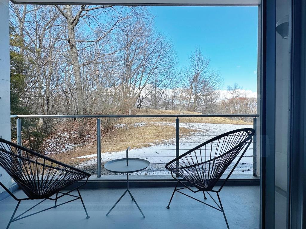 Balkón nebo terasa v ubytování Karuizawa Tennku Hotel & Resort
