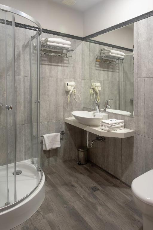 Koupelna v ubytování Sephia Hotel