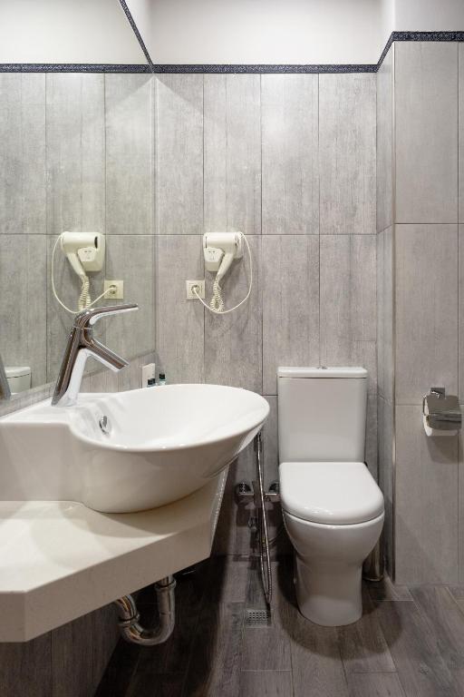Koupelna v ubytování Sephia Hotel