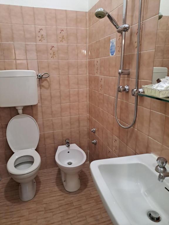 Koupelna v ubytování Hotel Helvetia